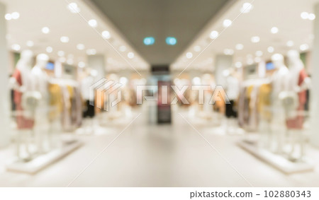 Abstract blur clothing boutique display interior of shopping mall background 102880343