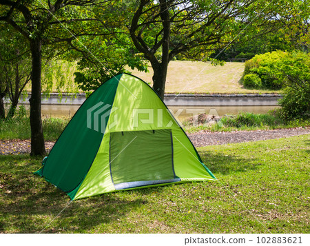 Campsite tent with beautiful nature 102883621