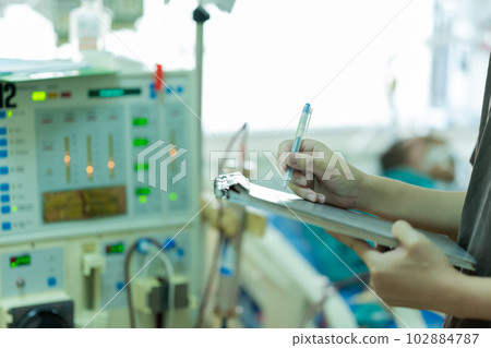 The specialist aThe specialist are checking continuous renal replacement therapy equipment and inre checking continuous renal replacement therapy equipment and injection pump and hemodialysis machine. The specialist aThe specialist are checking continuous renal replacement therapy equipment and inre checking continuous renal replacement therapy equipment and injection pump and hemodialysis machine. 102884787