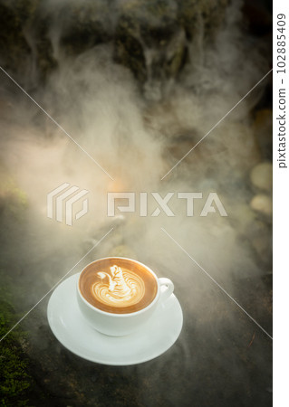 Background Coffee cup and beans on old kitchen table. Background Coffee cup and beans on old kitchen table. 102885409