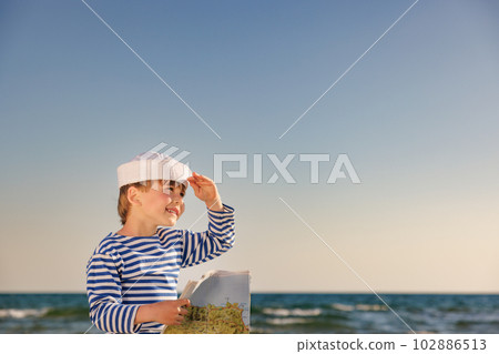 Happy child on summer vacation Happy child on summer vacation 102886513