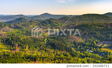 View of the summer landscape of the Lusatian Mountains from the viewpoint on the Klic Mountain. Czech Republic View of the summer landscape of the Lusatian Mountains from the viewpoint on the Klic Mountain. Czech Republic 102886721