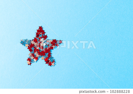 Star formed with red, blue and white stars of flag of united states of america with copy space Star formed with red, blue and white stars of flag of united states of america with copy space 102888228