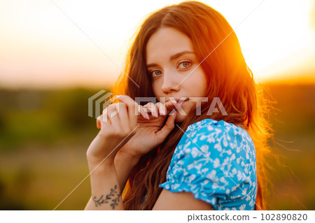 Young woman resting in nature. People, lifestyle, relaxation concept. 102890820