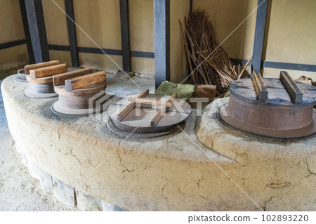 Furnaces and pots in an old folk house 102893220