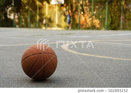 Basketball ball on the outdoor sports ground. Sports concept 102893232