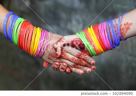 Shaking hands 102894090