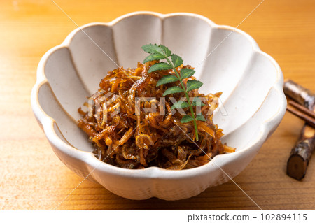 Ginger and dried young sardines boiled down in soy Ginger and dried young sardines boiled down in soy 102894115