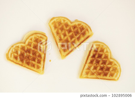 Heart shaped cookies. Viennese waffles on a white background 102895006