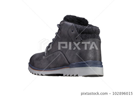Leather boot close up on a white background Leather boot close up on a white background 102896015