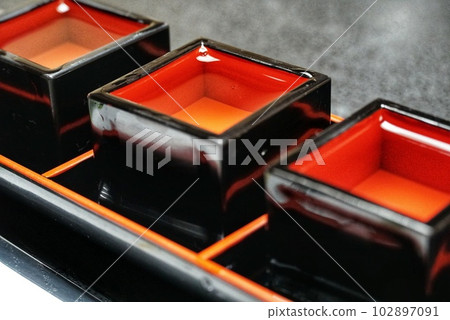 Delicious tasting set of cold sake 102897091