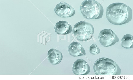Drops of gel face serum top view. Abstract gel drops for design. Liquid gel moisturizer. 102897993
