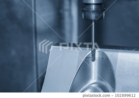 The CNC milling machine cutting injection mold part by solid ball end mill tool. The CNC milling machine cutting injection mold part by solid ball end mill tool. 102899612
