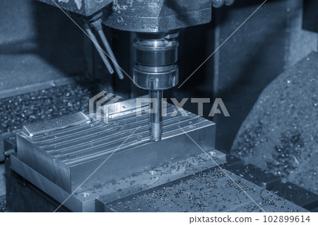 The CNC milling machine rough cutting the injection mold parts by indexable tools. 102899614