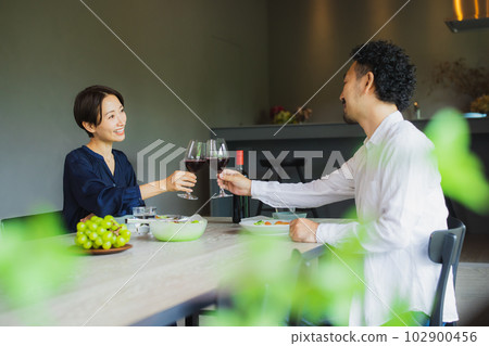 A couple dining at a restaurant A couple dining at a restaurant 102900456