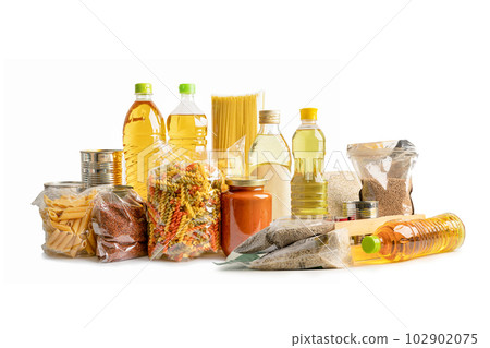 Foodstuff for donation isolated on white background with clipping path, storage and delivery. Various food, pasta, cooking oil and canned food. Foodstuff for donation isolated on white background with clipping path, storage and delivery. Various food, pasta, cooking oil and canned food. 102902075