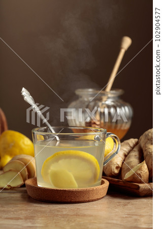 Ginger tea with lemon and honey. Ginger tea with lemon and honey. 102904577