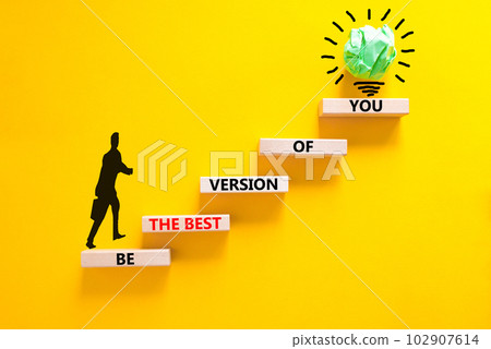 Motivational and inspirational symbol. Concept words Be the best version of you on wooden block. Beautiful yellow background Businessman icon. Business motivational inspirational concept. Copy space. Motivational and inspirational symbol. Concept words Be the best version of you on wooden block. Beautiful yellow background Businessman icon. Business motivational inspirational concept. Copy space. 102907614