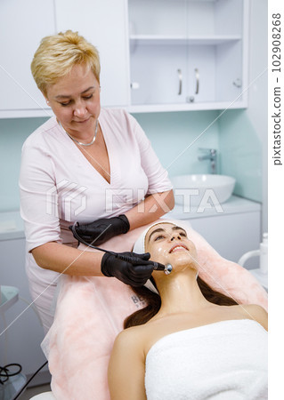 Facial rejuvenation, lifting procedure, Skin exfoliation, Microdermabrasion therapy, skin renewal, Cosmetic service, Beauty treatment, Facial cosmetic treatment, Dermatology Services 102908268