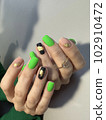 fashion manicure of nails on a beautiful background 102910472