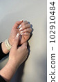 fashion manicure of nails on a beautiful background 102910484