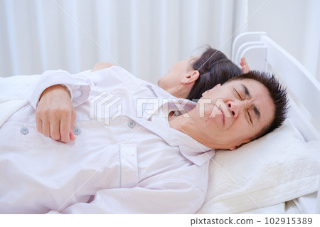 sleep deprived senior man sleep deprived senior man 102915389
