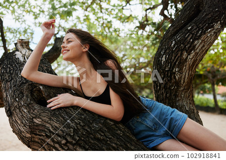 hill woman sea vacation sitting smiling nature tree relax sky lifestyle hill woman sea vacation sitting smiling nature tree relax sky lifestyle 102918841