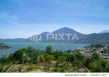 View of Mount Abang and Lake Batur in Kintamani Plateau View of Mount Abang and Lake Batur in Kintamani Plateau 102921729