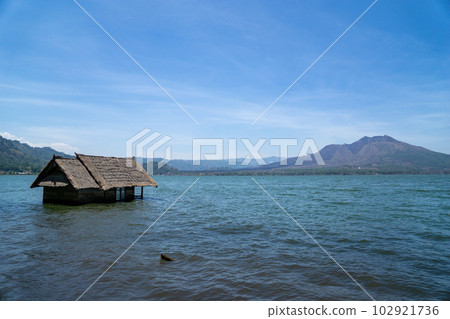 Mysterious flooded house on Lake Batur Mysterious flooded house on Lake Batur 102921736