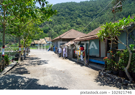 A small village on the shores of Lake Batur in the Kintamani Plateau A small village on the shores of Lake Batur in the Kintamani Plateau 102921746