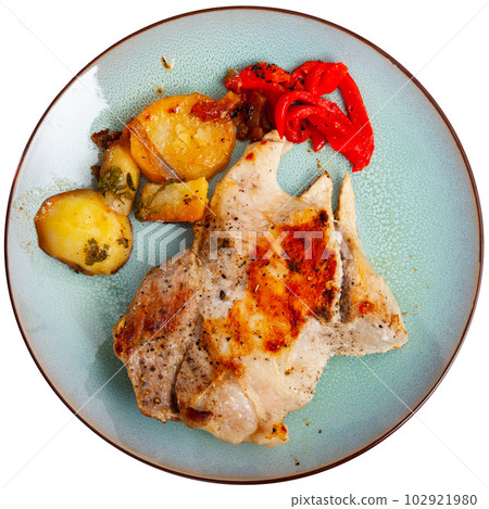 Roasted pork shoulder with baked potatoes and pepper 102921980
