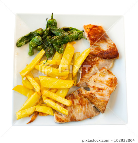Roasted pork meat with baked peppers and fried potatoes 102922804