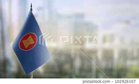 Small flags of the ASEAN on an abstract blurry background 102926107
