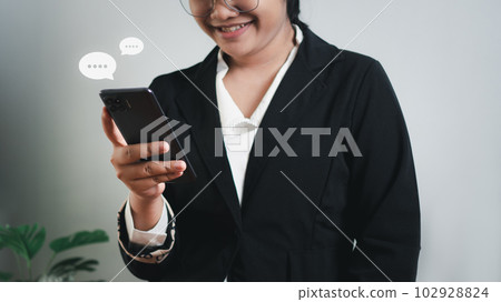 Businesswoman hand using smartphone typing live chat chatting on application communication digital web and social network concept. Social media application chat box. 102928824