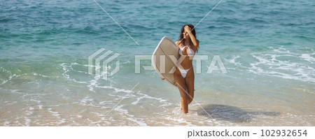 Smiling Surfer Girl - Summer Sport and Fun on Paradise Tropical Beach Smiling Surfer Girl - Summer Sport and Fun on Paradise Tropical Beach 102932654