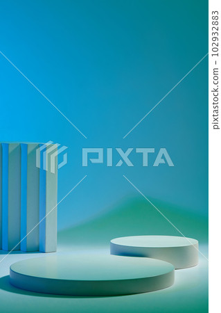 Front view of empty round podiums displayed on gradient blue background. Space for design, place mockup. Blank minimalistic empty showcase template 102932883
