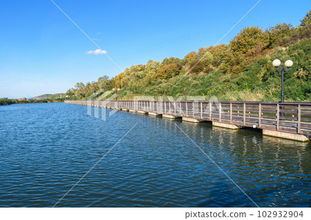 Wooden promenade along the Baltic Sea coas. Yantarny. Kaliningrad region. Russia 102932904