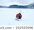whiskey covered in snow 102935096