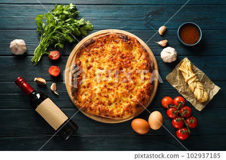 National Georgian cuisine food, flour product - Khachapuri National Georgian cuisine food, flour product - Khachapuri 102937185