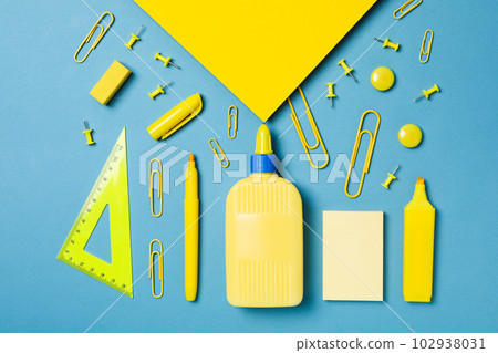 Concept of different office stationery with glue 102938031