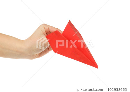 Female hand with paper plane isolated on white background Female hand with paper plane isolated on white background 102938663