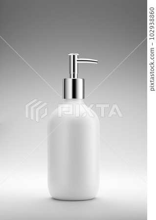 White pump bottle unlabeled for lotion or cleanser isolated on gray background. Vector illustration template for advertising. White pump bottle unlabeled for lotion or cleanser isolated on gray background. Vector illustration template for advertising. 102938860