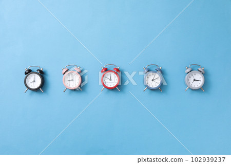 Concept of sleep and wake up with alarm clocks 102939237