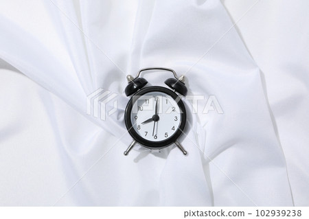 Concept of sleep and wake up with alarm clock 102939238