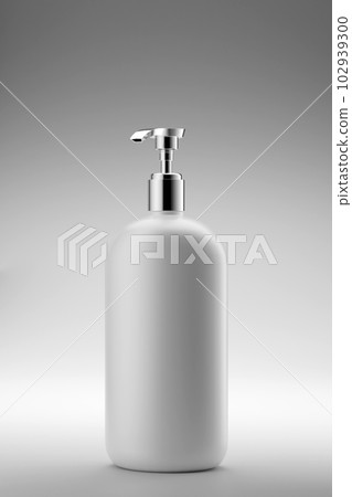 A blank label pump bottle dispenser decorated on light background. Promoting cleanser, shampoo, foams or lotion products. 3D rendering beauty and hygiene concept A blank label pump bottle dispenser decorated on light background. Promoting cleanser, shampoo, foams or lotion products. 3D rendering beauty and hygiene concept 102939300