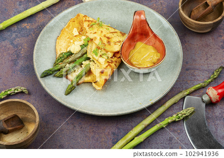 Healthy asparagus omelet on the plate 102941936
