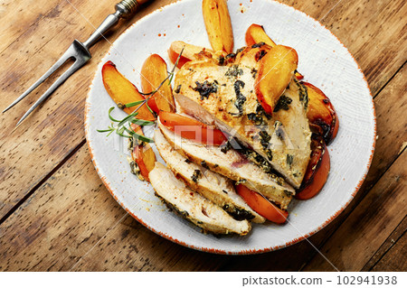 Roasted or grilled chicken breast with persimmon. Roasted or grilled chicken breast with persimmon. 102941938