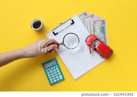 Concept of car purchase and insurance with toy car Concept of car purchase and insurance with toy car 102941992