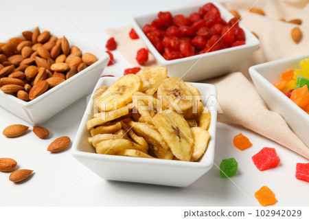 Tasty food concept - delicious dried fruits, tasty dried food 102942029