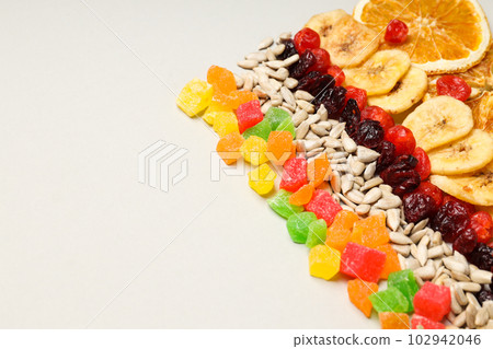 Tasty food concept - delicious dried fruits, space for text 102942046
